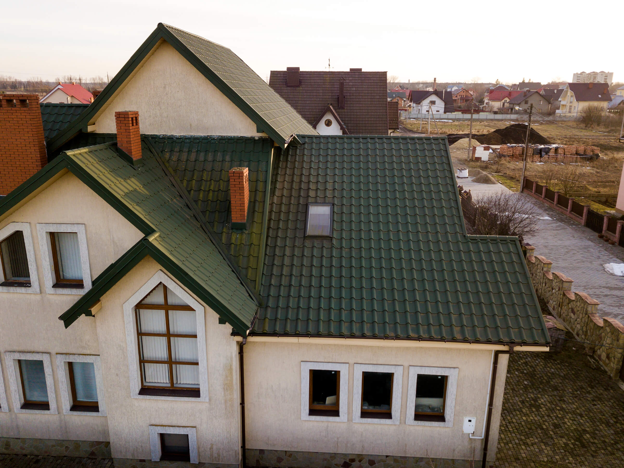 aerial-view-of-new-residential-house-cottage-with-2023-11-27-04-55-39-utc (1)